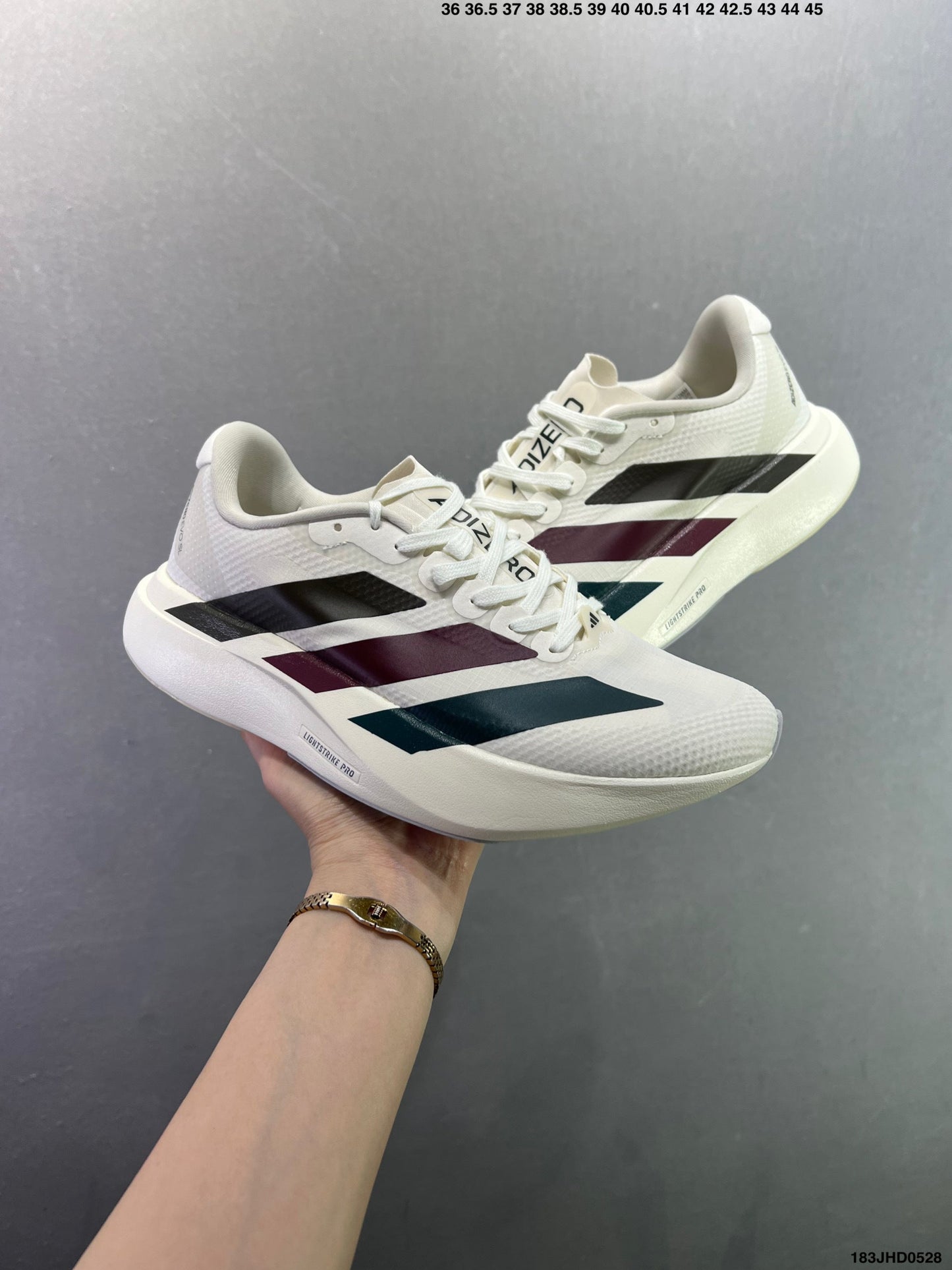 Adizero Evo SL WOVEN M  183JHD0528