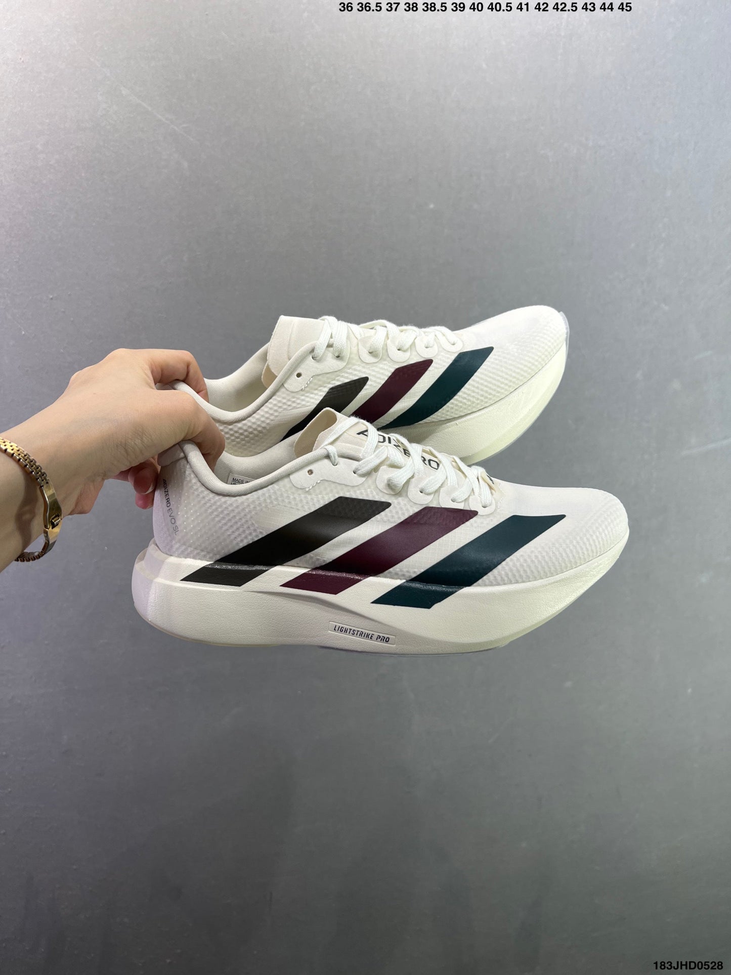 Adizero Evo SL WOVEN M  183JHD0528