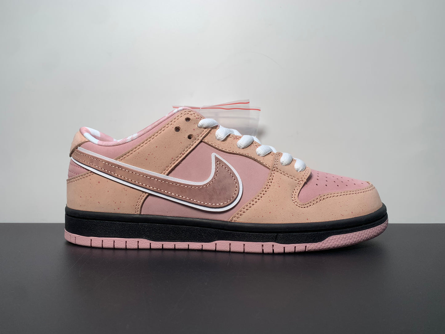 CONCEPTS × Nike Dunk SB Low Pink Lobster